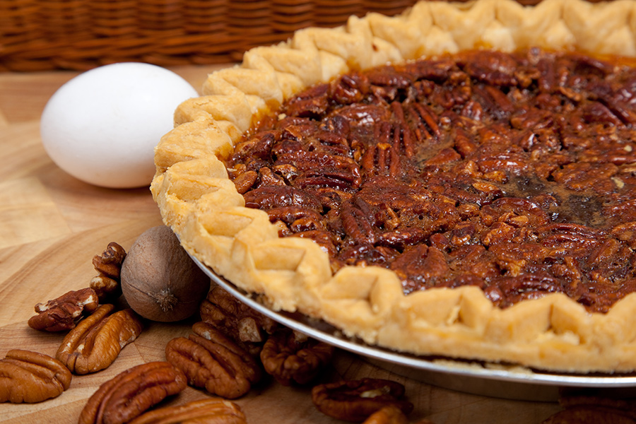 mio-month-900x600.jpg Pecan pie on wooden table